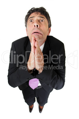 Desperate businessman praying