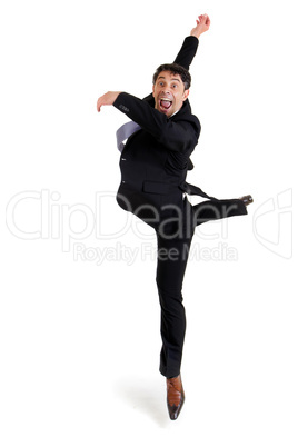 Agile businessman doing a pirouette