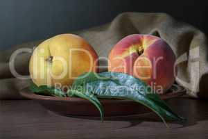 Two ripe peach