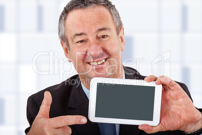 Businessman pointing to his Tablet PC