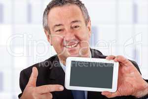 Businessman pointing to his Tablet PC