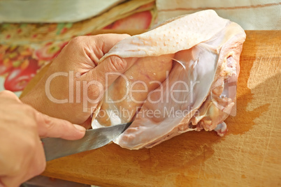 Bird meat cutting with a knife