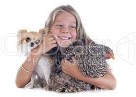 child, dog and chicken