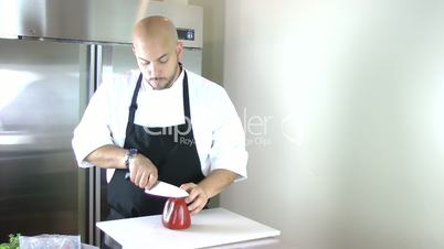 Chef testing the knife in the kitchen. Timelapse