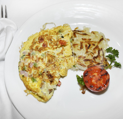 Omelet With Vegetables And Bacon