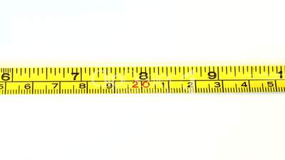 Tape measure on white