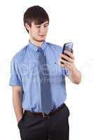 Young businessman looking at his smartphone