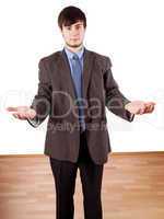 Young businessman with open hands