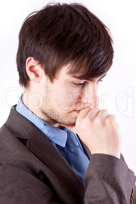 Young businessman in thinking