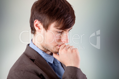 Young businessman in thinking