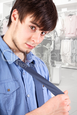 Young man in necktie tie