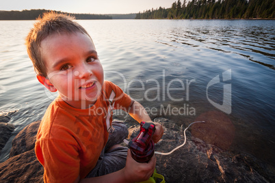Boy by the lake