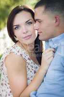 Mixed Race Romantic Couple Portrait in the Park