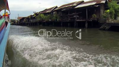 longtail boat pov in bangkok khlongs