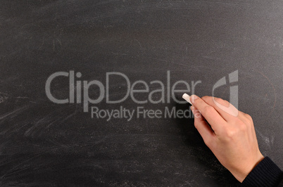 Writing on a blackboard