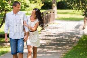 Cheerful Caucasian couple walking outdoors