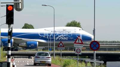 Boeing 747 Jumbo airplane on taxiway bridge traffic 11044