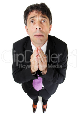 Desperate businessman praying