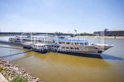 cruise ships docked on danube river shore in budapest
