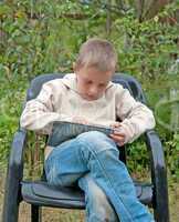 Kid with tablet pc.