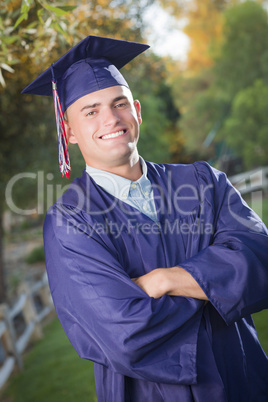 Handsome Male Graduate in Cap and Gown