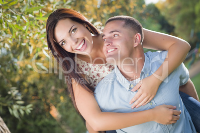 Mixed Race Romantic Couple Portrait in the Park