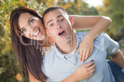 Mixed Race Romantic Couple Portrait in the Park