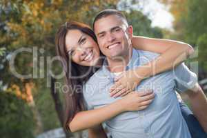 Mixed Race Romantic Couple Portrait in the Park
