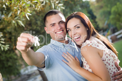 Happy Excited Couple with New House Keys