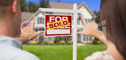 Sold For Sale Sign, House and Military Couple Framing Hands