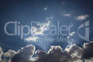 Silver Lined Storm Clouds with Light Rays and Copy Space