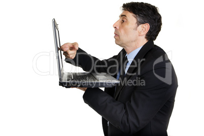 businessman tapping his laptop screen