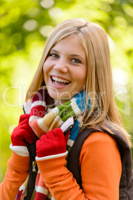 Autumn happy girl smiling teenager colorful scarf