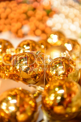 Shiny golden Christmas bulbs