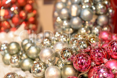 Glittering silver and pink Christmas baubles