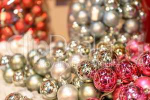 Glittering silver and pink Christmas baubles