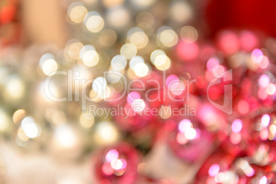 Blurred shiny silver and pink Christmas background