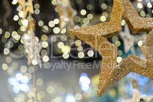 Star Christmas ornament on blurred background