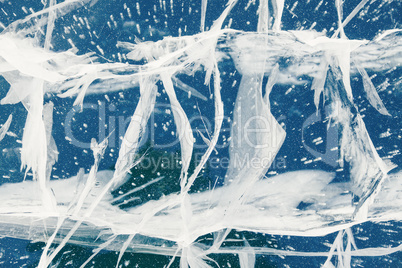 texture of ice of baikal lake in siberia