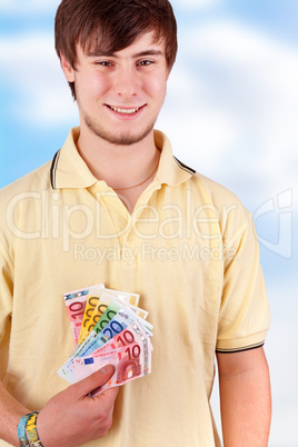 Young man shows his joy bills