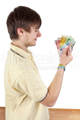 Young man shows his joy bills