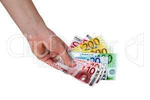 Hand holding banknotes