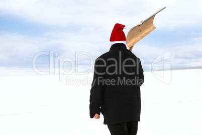 Man with snow shovel