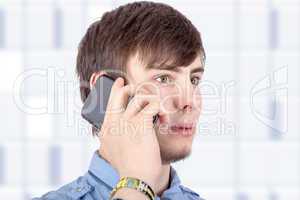 Young businessman calling by phone