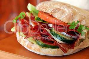 appetizing sandwich with ham and vegetables