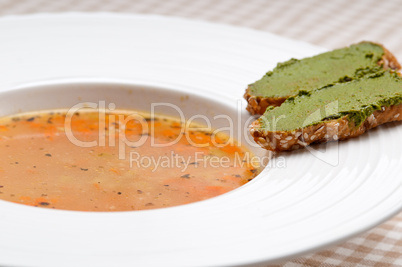 italian minestrone soup with pesto crostini on side