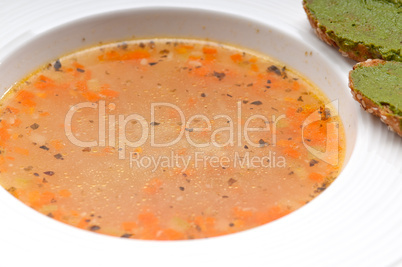 italian minestrone soup with pesto crostini on side