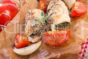 chicken breast with spinach, baked tomatoes and herbs