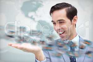 Joyful businessman looking at a picture whirl