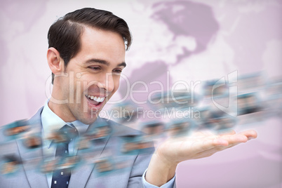 Cheerful businessman admiring a picture whirl